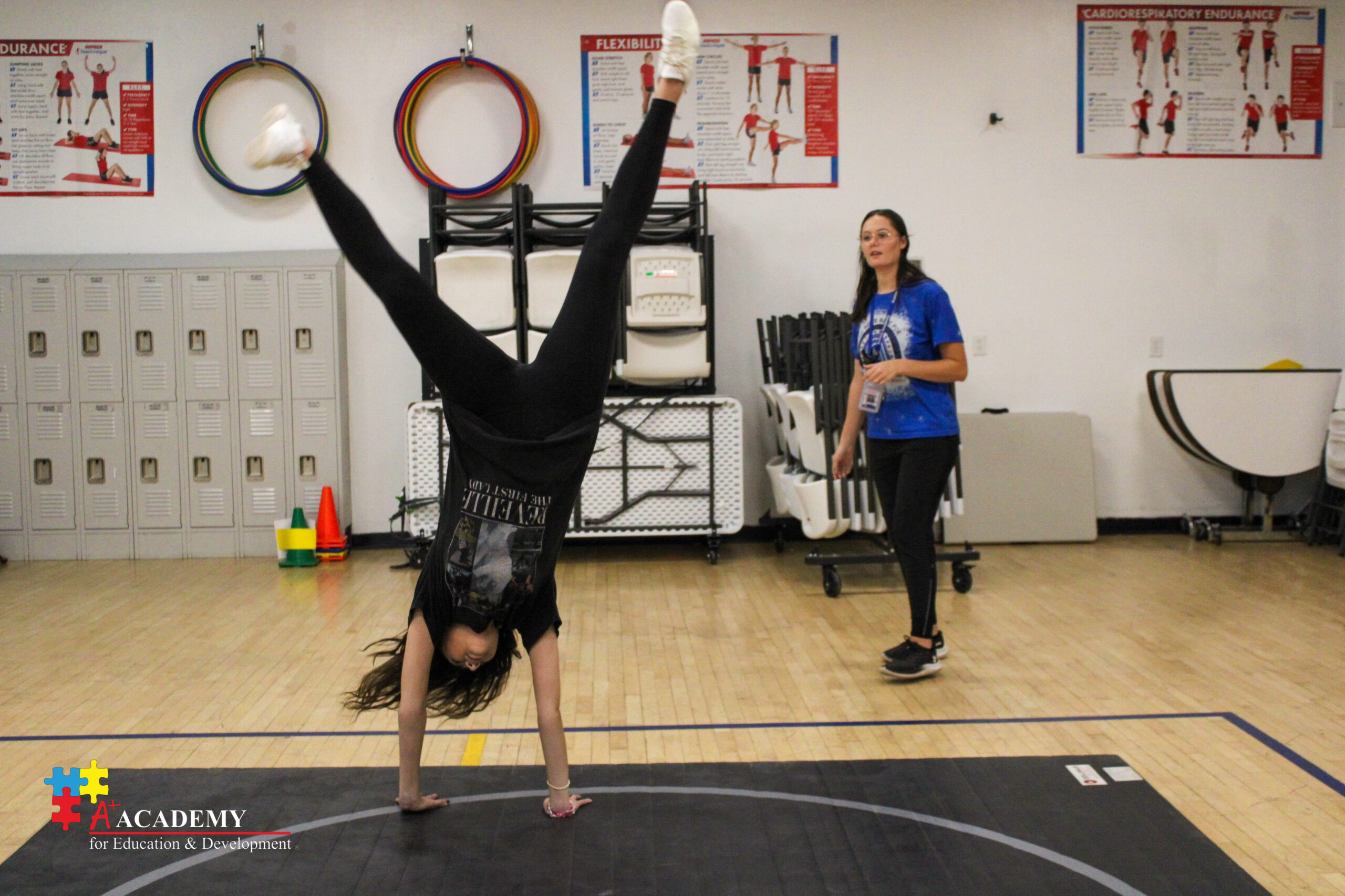 girl doing a cartwheel for special olympics gymnastics