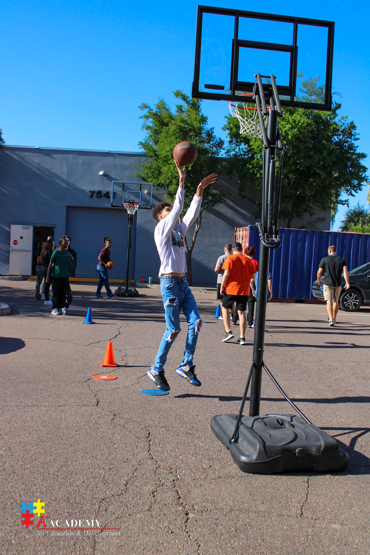 boy practicing basketball special olympics