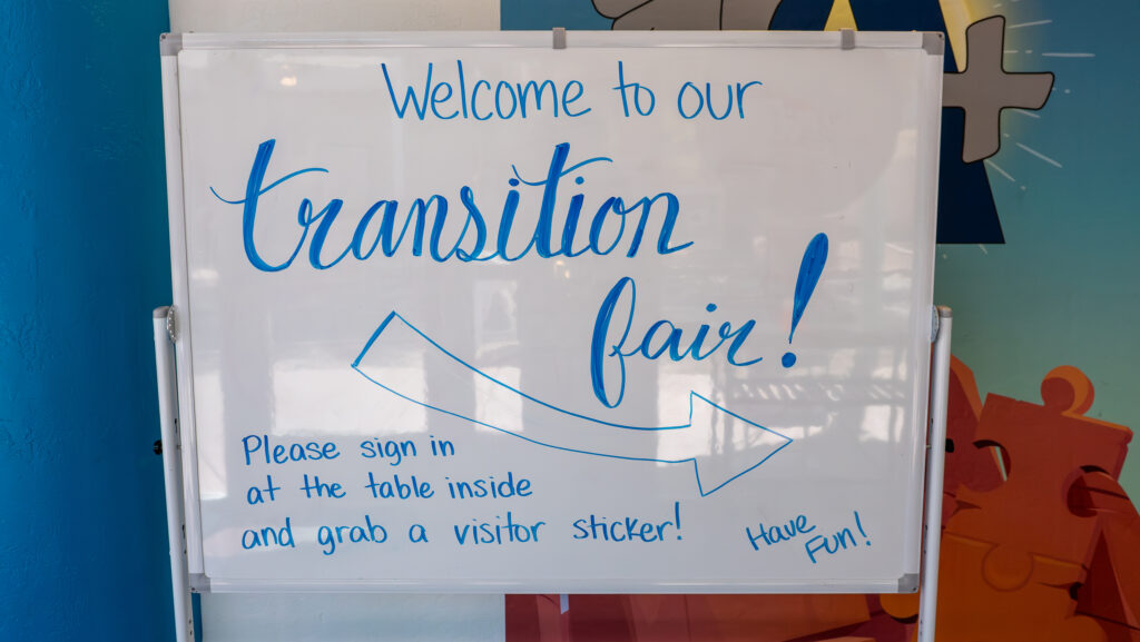 a whiteboard that says welcome to the transition fair